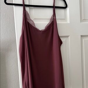 Maurice’s tank top.